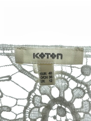 40 Beden beyaz Renk Koton Bluz %70 İndirimli.