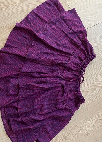 Mor Kloş katlı kısa etek s/m