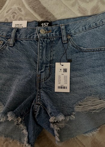 Kadın Mavi Yırtık Denim Şort - Görsel 4