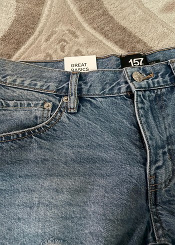 Kadın Mavi Yırtık Denim Şort - Görsel 5