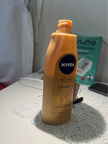Beden Renk Nivea Q10 sıkılaştırıcı ve Bronzlaştırıcı Krem