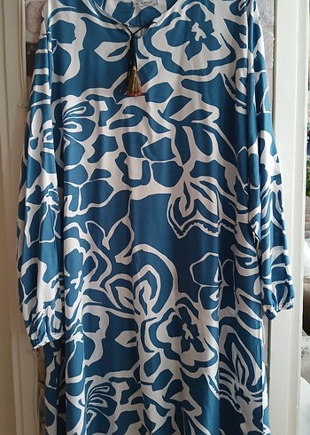 Tunik iki kol arası 60cm x boyu 100 cm beden 3XL yazıyor