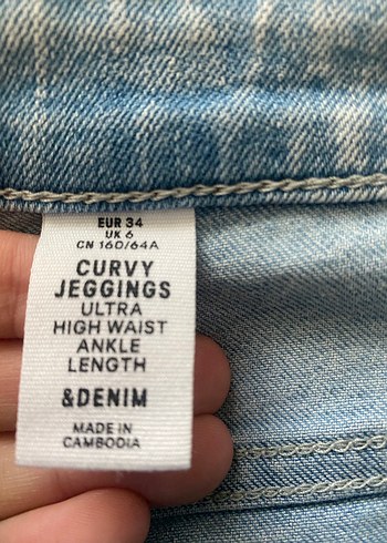 H&M Mavi Midi Kesim Yırtık Detaylı Kadın Kot Pantolon