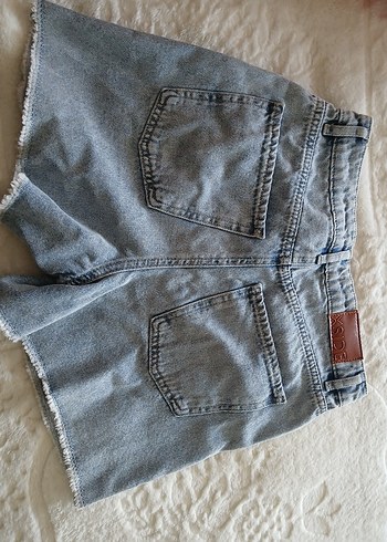 Mavi Yırtık Detaylı Kadın Kot Şort - Görsel 3