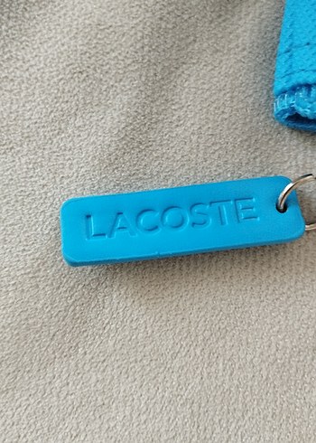  Beden mavi Renk Lacoste Mavi Fermuarlı Kadın Clutch Çanta orjinaldir