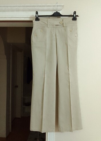Krem rengi Lcwakiki ürünü likralı keten pantolon 