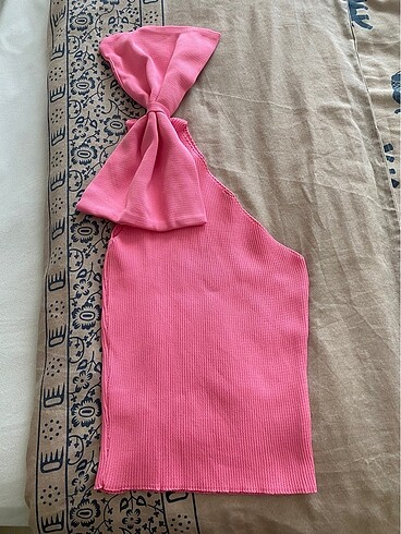 Pembe tek kol fiyonk detaylı triko bluz