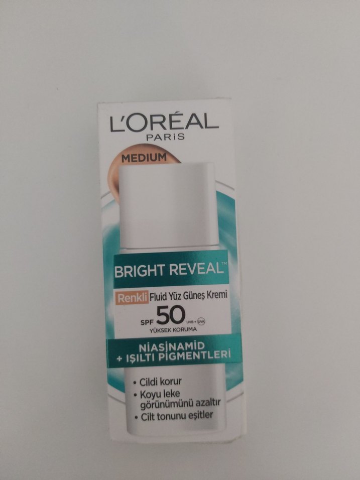 L'Oréal SPF50+ Işıltı Pigmentli Yüz Koruyucu - Görsel 2