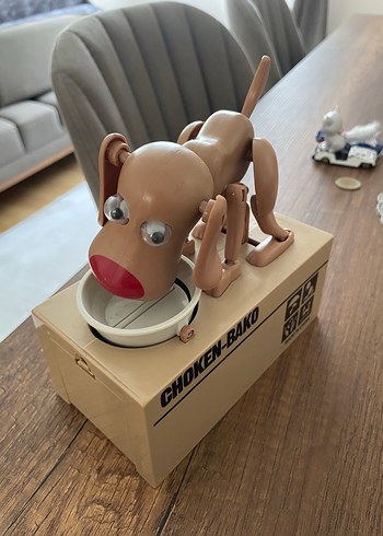Para yiyen köpek kumbara