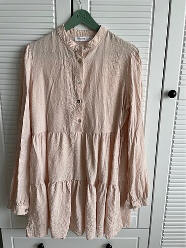 Tunik touche