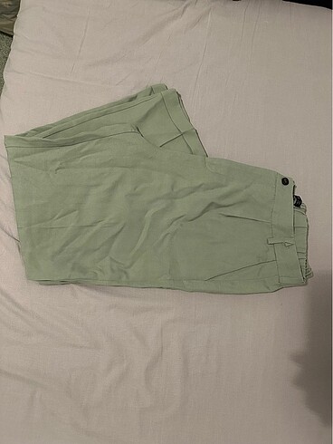 Su yeşili pantolon