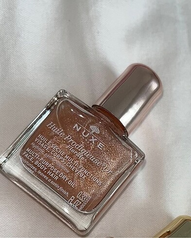 Nuxe pink gold