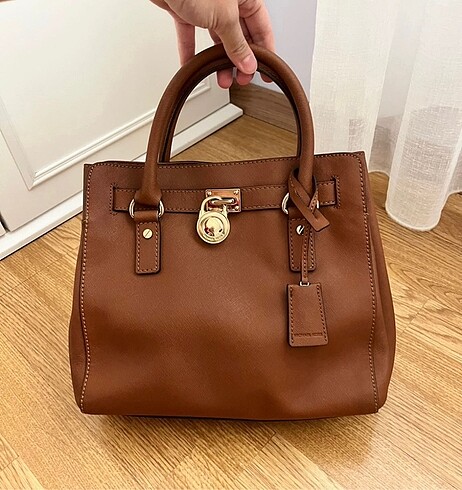 Michael kors taba askılı kol çantası