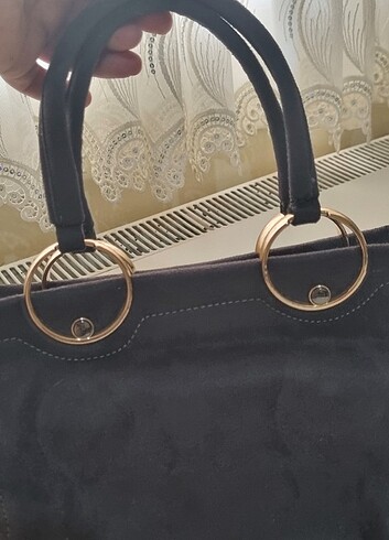 Beden gri Renk Kol çantası ve yandan çapraz kullanılan çanta