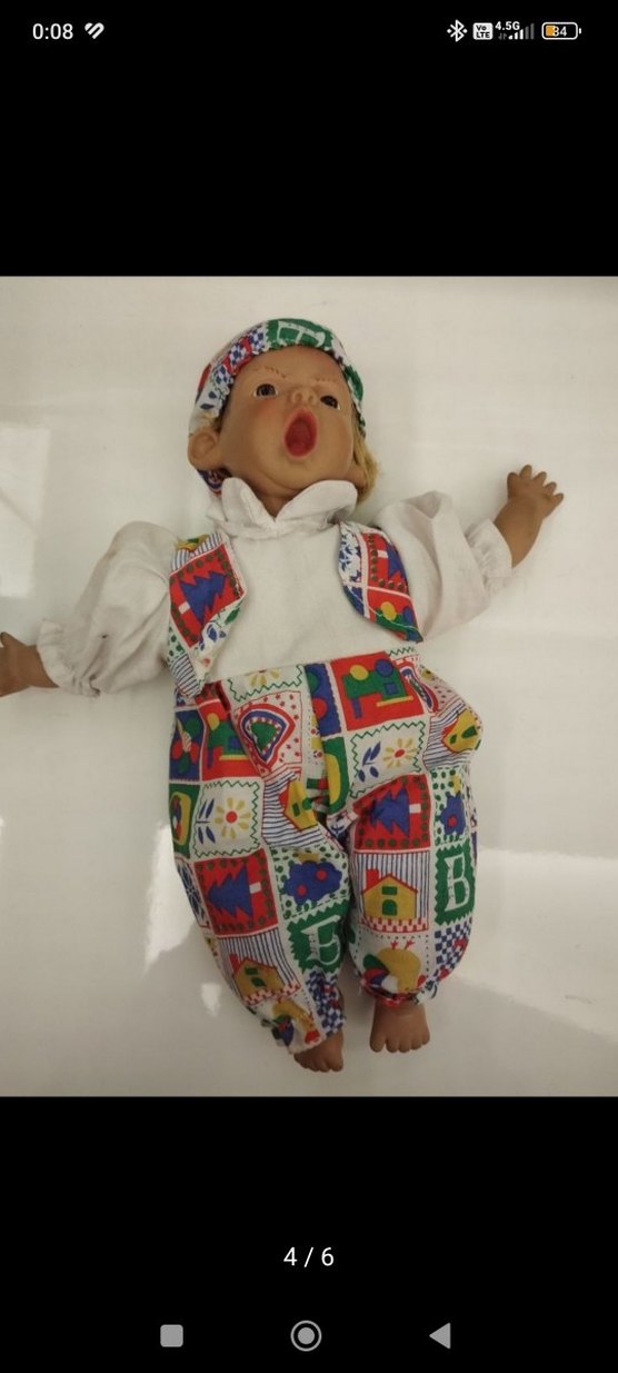 Renkli Desenli Kıyafetli Porselen Bebek - Görsel 4