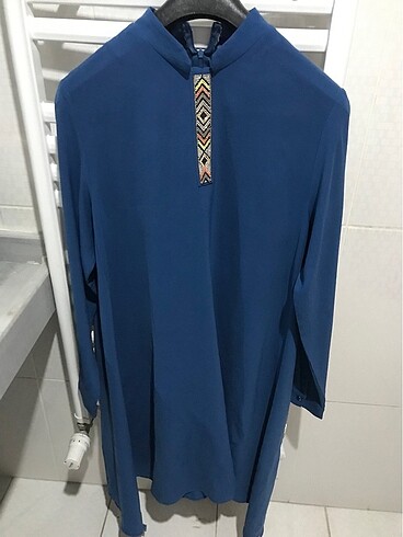 Asimetrik kesim tunik