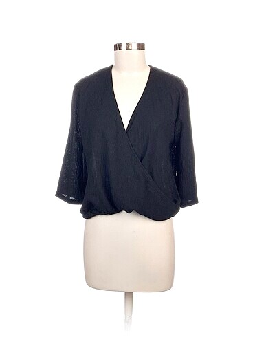Zara Bluz %70 İndirimli.