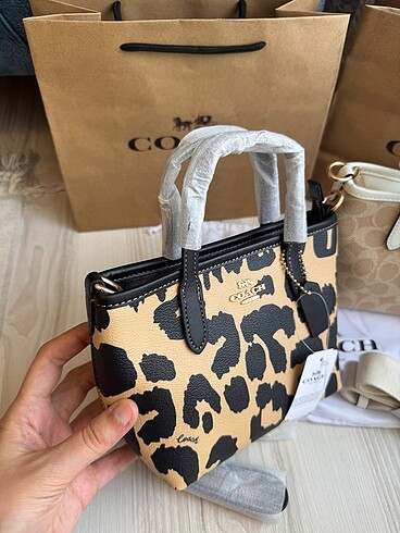 Coach Coach mini city tote model çapraz çanta taba renk .Tarafınıza t