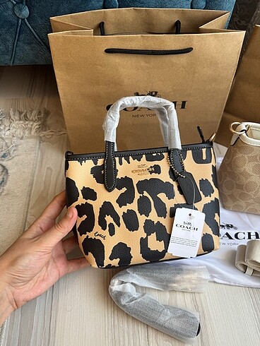 Coach mini city tote model çapraz çanta taba renk .Tarafınıza t
