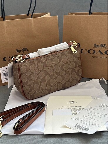 Beden Coach messico model çapraz çanta.bej renk .Tarafınıza toztorbası