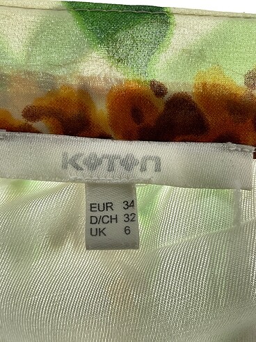 34 Beden çeşitli Renk Koton Midi Etek %70 İndirimli.