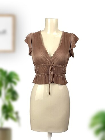 Zara Bluz %70 İndirimli.