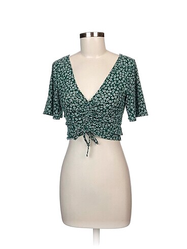 H&M Bluz %70 İndirimli.