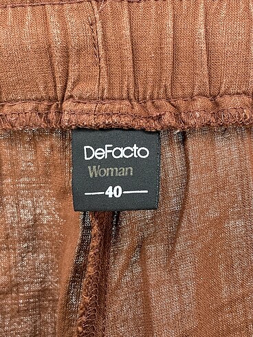 40 Beden kahverengi Renk Defacto Kumaş Pantolon %70 İndirimli.