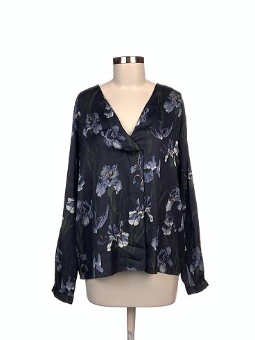 H&M Bluz %70 İndirimli.