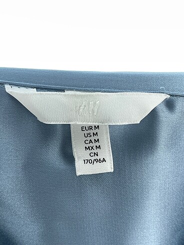 m Beden mavi Renk H&M Bluz %70 İndirimli.
