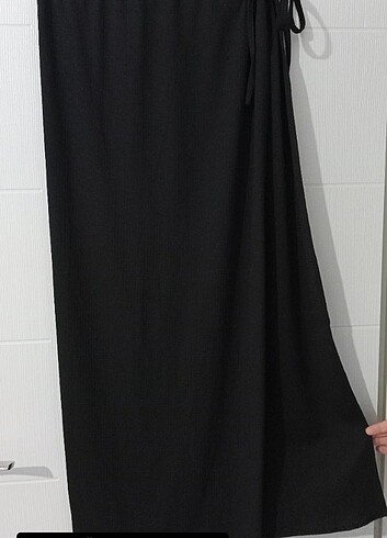 Bürumcuk etek yandan yırtmaçlı içinde kalıyor