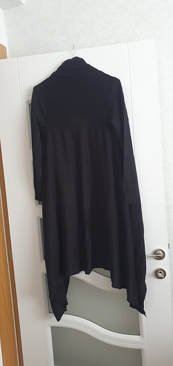 l Beden siyah Renk iki kol arası 55cm salaş model 120cm boyunda hırka ince triko 