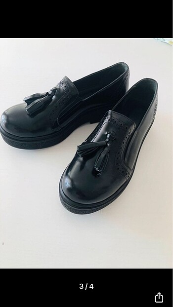 Siyah ayakkabısı