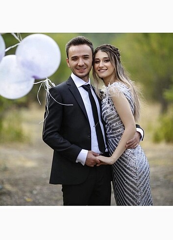 Erkek takım elbise, kullanan kişinin boyu 173 kilosu 64