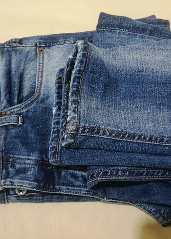 Kadın Mavi Kemerli Dar Kesim Midi Kot Pantolon