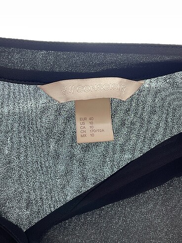 40 Beden siyah Renk H&M Gömlek %70 İndirimli.