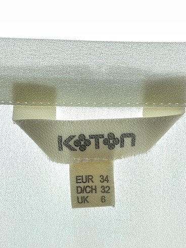 34 Beden beyaz Renk Koton Bluz %70 İndirimli.