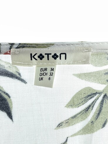34 Beden beyaz Renk Koton Kısa Elbise %70 İndirimli.
