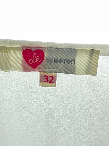 32 Beden beyaz Renk Koton Bluz %70 İndirimli.
