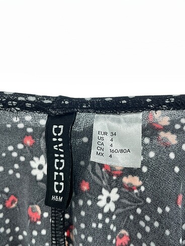34 Beden siyah Renk H&M Mini Elbise %70 İndirimli.