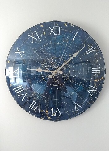 Astrolojik desenli duvar saati