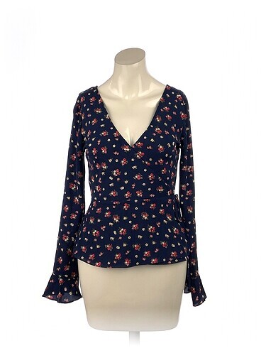 H&M Bluz %70 İndirimli.