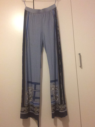 Bol paça dökümlü kumaş pantolon