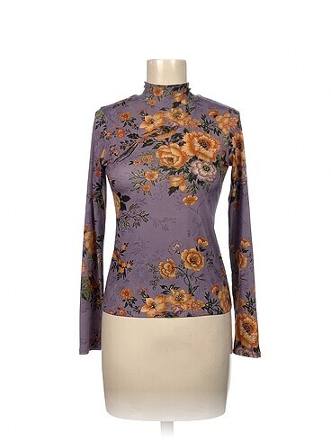 Zara Bluz %70 İndirimli.