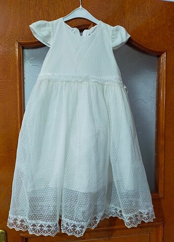 Cıvıl 9.10 yaş krem rengi kız çocuk elbisesi birkere bayramda gi