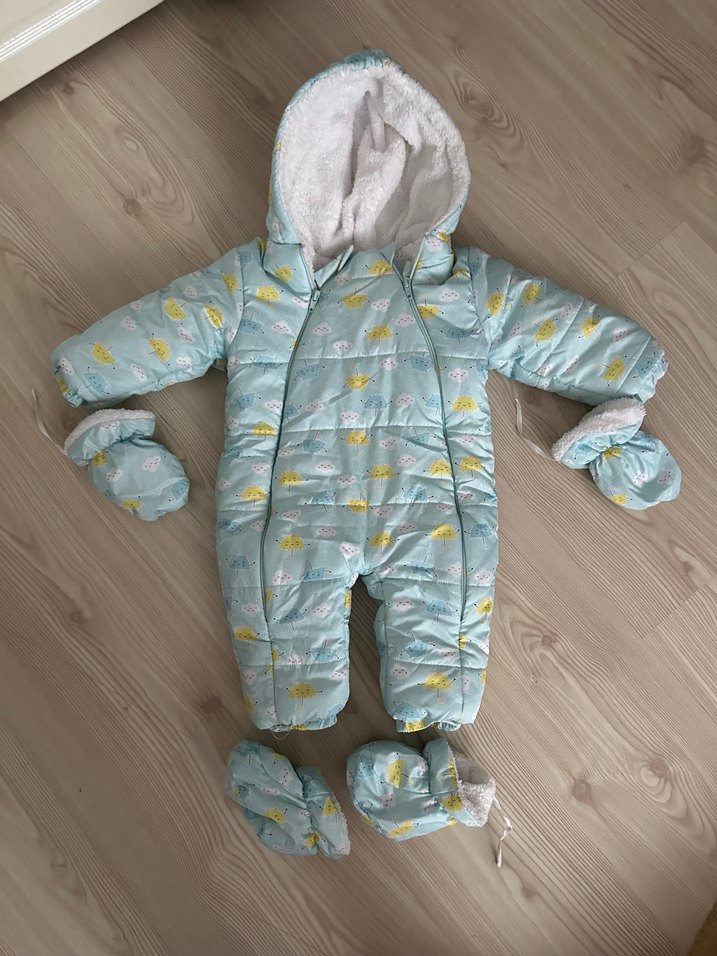 Mavi Peluş Kapüşonlu Bebek Tulumu
Astronot tulum - Görsel 2