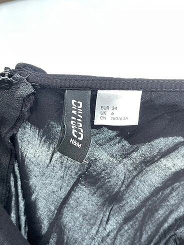 34 Beden siyah Renk H&M Uzun Tulum %70 İndirimli.