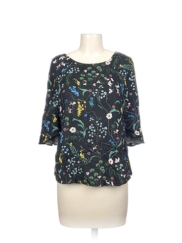 H&M Bluz %70 İndirimli.