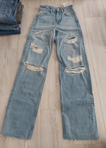 Yırtık Detaylı Rahat Kesim Kadın Denim Pantolon