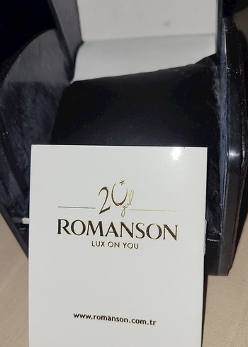 Romanson Siyah Romanson saat kutusu